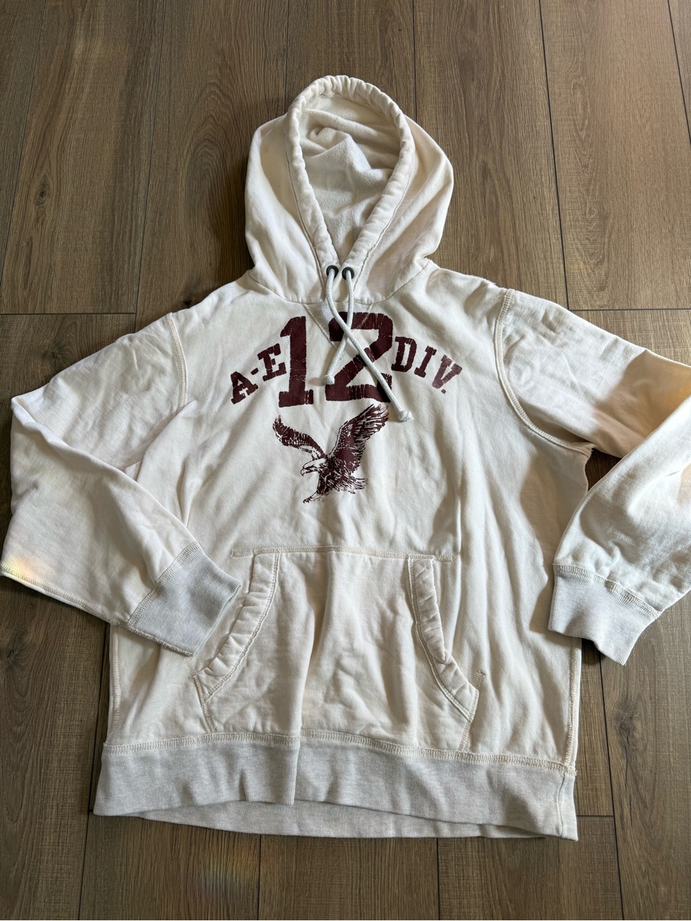 American Eagle Outfitters Off-White Pullover Hoodie with Maroon Graphic